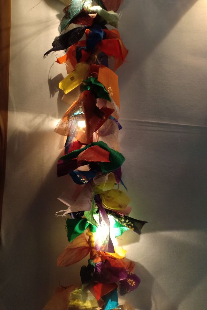 Autumn Bliss Fabric Garland by Bunko Junko: A vibrant garland made from upcycled fabric in warm, colorful hues.