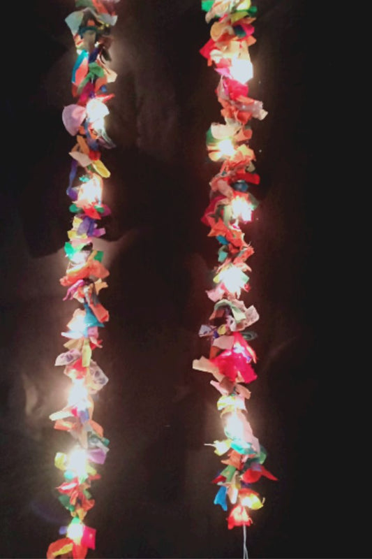 Autumn Bliss Fabric Garland by Bunko Junko: A vibrant garland made from upcycled fabric in warm, colorful hues.