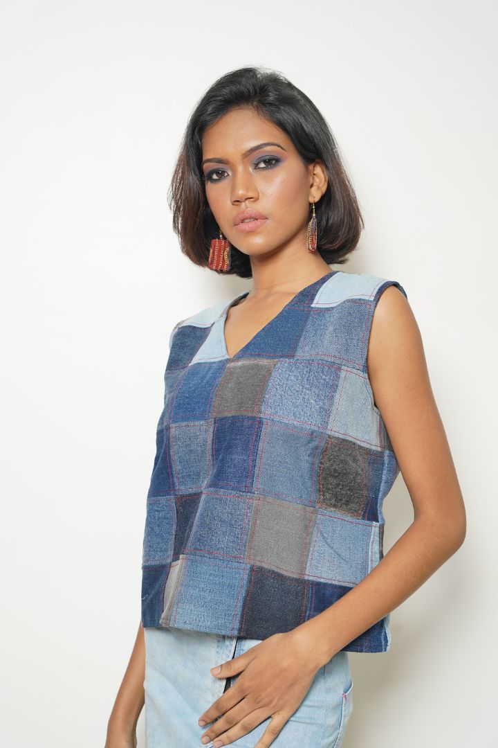 Checker Denim Sleeveless Top: A chic and versatile sleeveless top with a checker pattern.