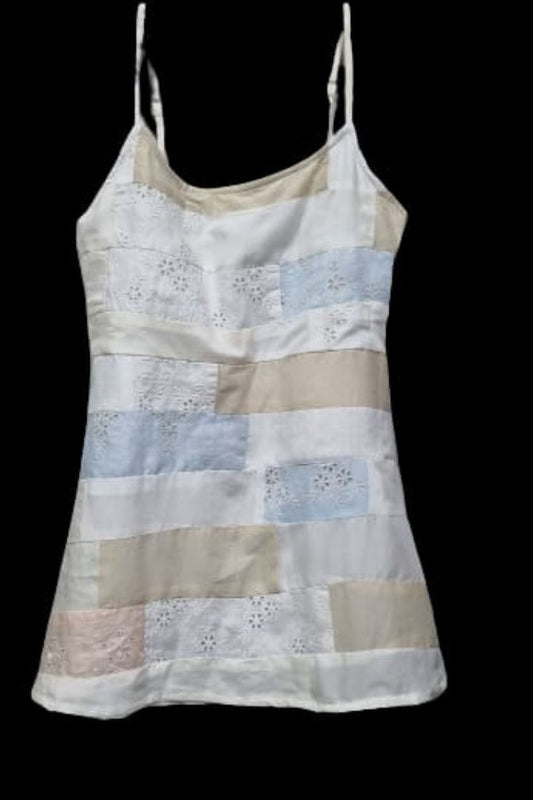 Chikankari Crop Top by Bunko Junko: An elegant crop top featuring intricate chikankari embroidery, perfect for a chic, traditional look.