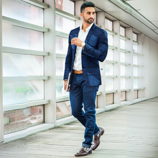 Blue denim patchwork blazer with a tailored fit, featuring a unique mosaic design and versatile style.