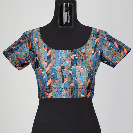 A vibrant multicolor blouse made from upcycled fabrics, featuring a unique patchwork design. The blouse showcases a relaxed fit, perfect for casual and semi-formal occasions, representing sustainable and eco-friendly fashion.