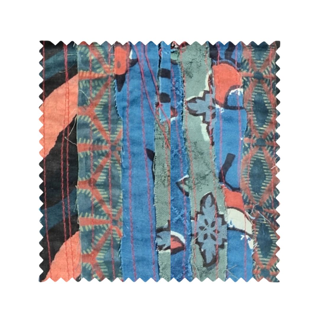 A vibrant multicolor blouse made from upcycled fabrics, featuring a unique patchwork design. The blouse showcases a relaxed fit, perfect for casual and semi-formal occasions, representing sustainable and eco-friendly fashion.