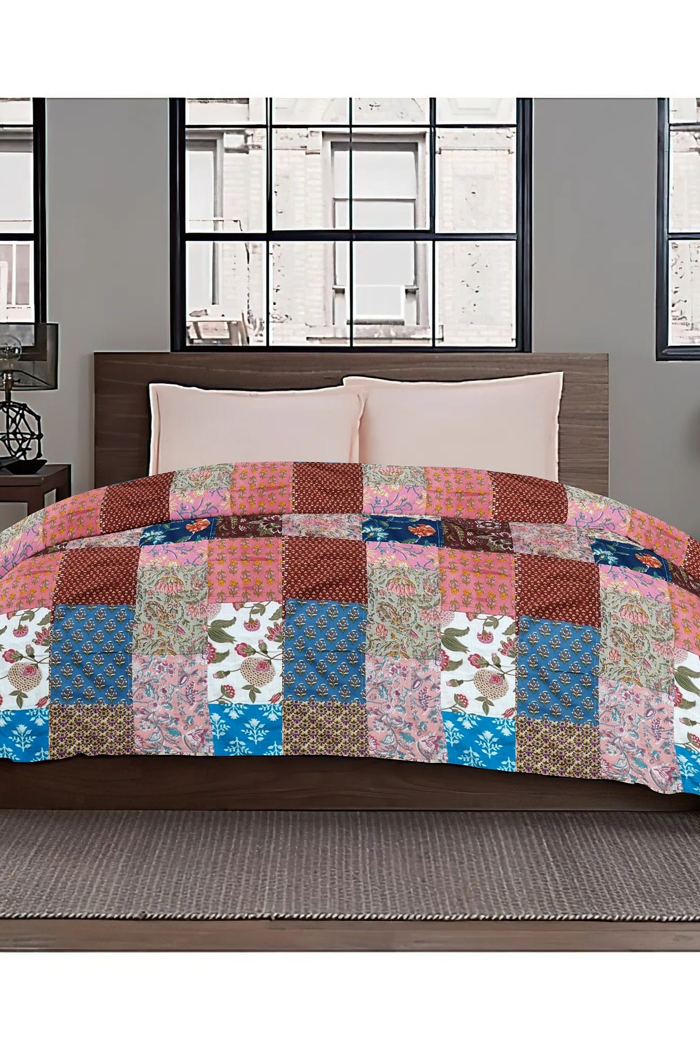 Colorful ethnic print patchwork bed quilt by Bunko Junko, showcasing vibrant and artistic designs with a blend of ethnic patterns. Ideal for adding a unique touch to your bedroom decor.