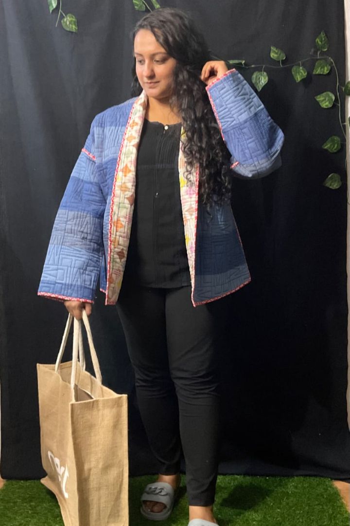 Wrap yourself in luxury and style with Bunko Junko's Adapta Versatile Puffer Jacket.