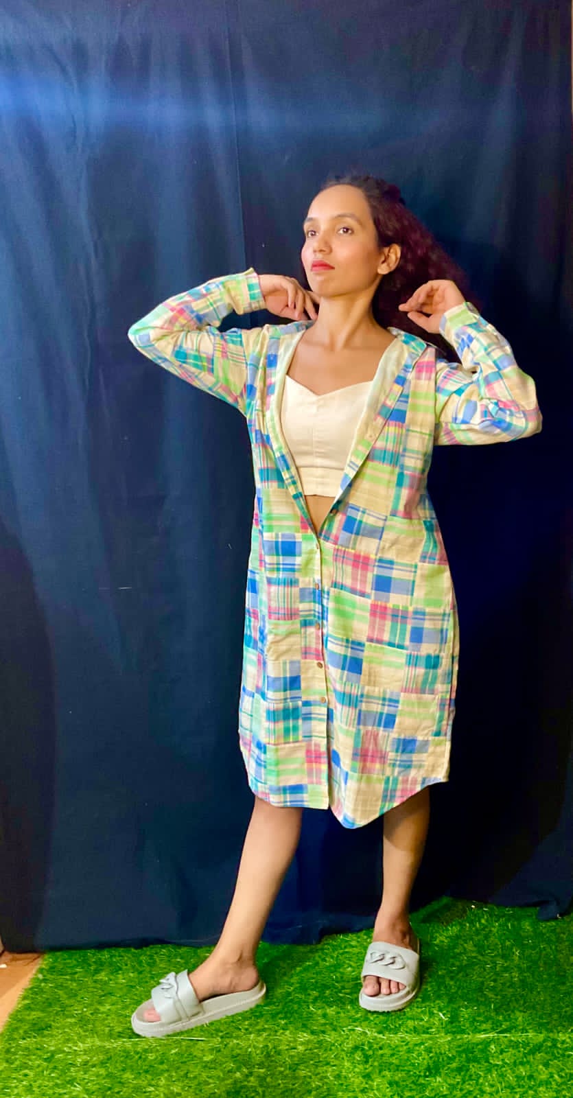 A sleek and stylish button-up dress, perfect for those who appreciate refined fashion.