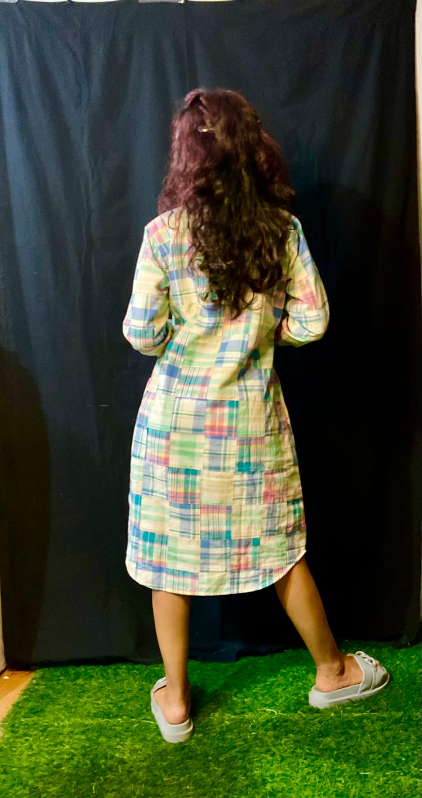 A sleek and stylish button-up dress, perfect for those who appreciate refined fashion.