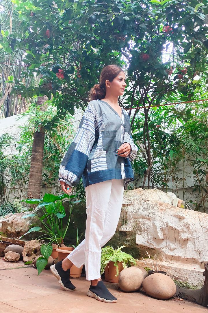 Discover the chic Linci Pinci Top in grey, crafted from high-quality textile offcuts. Perfect for Gen Z fashionistas who value sustainability and style. Shop now to make a statement with eco-friendly fashion!