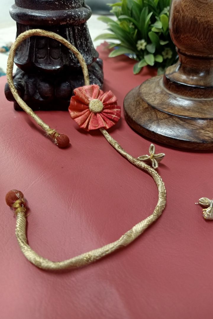 Handcrafted Rakhi symbolizes love and protection for sacred celebrations.