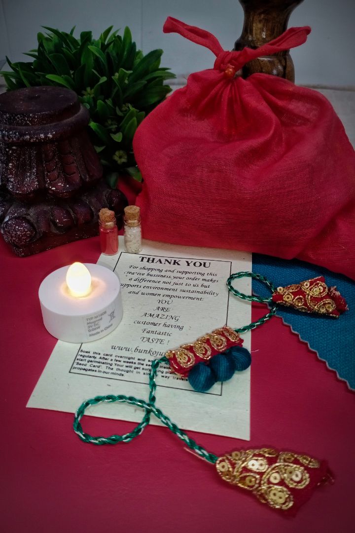 Handcrafted textile Rakhi made from eco-friendly offcuts for Pavitra Tyohar celebration.