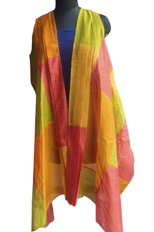 Patchwork Shrug by Bunko Junko: A chic, upcycled shrug with a vibrant patchwork design.