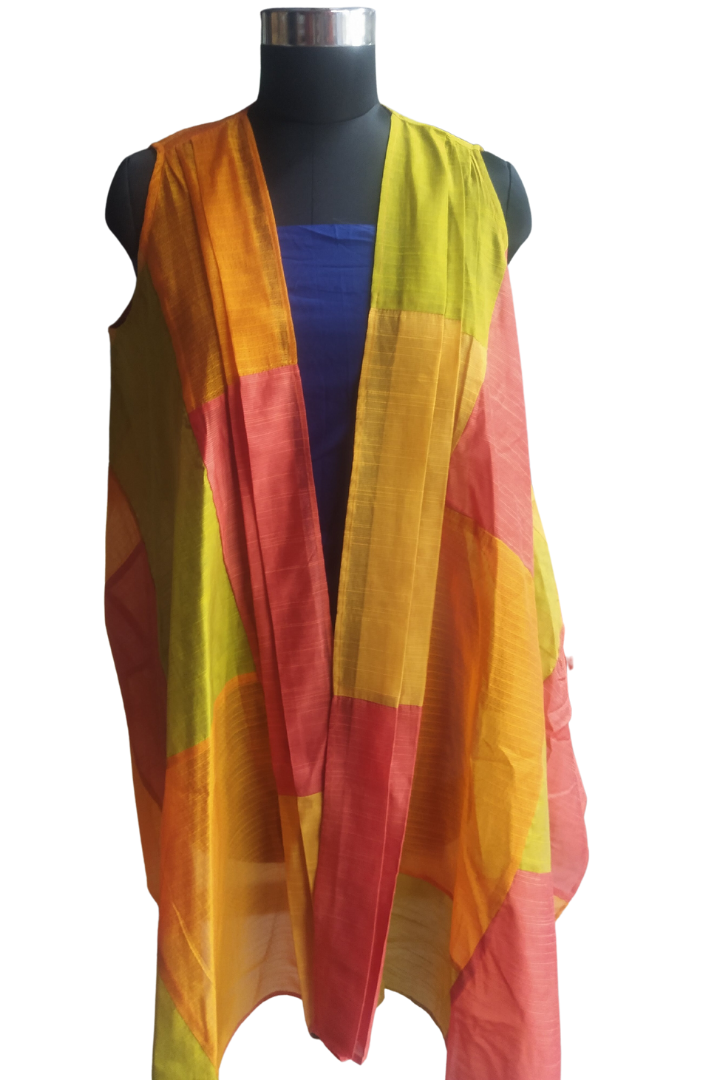 Patchwork Shrug by Bunko Junko: A chic, upcycled shrug with a vibrant patchwork design.