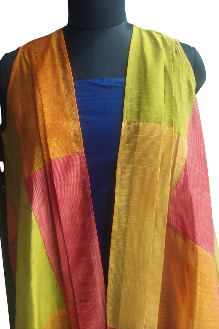 Patchwork Shrug by Bunko Junko: A chic, upcycled shrug with a vibrant patchwork design.