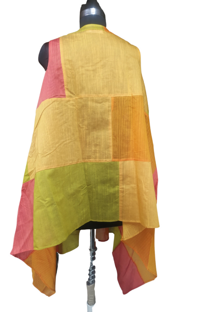 Patchwork Shrug by Bunko Junko: A chic, upcycled shrug with a vibrant patchwork design.