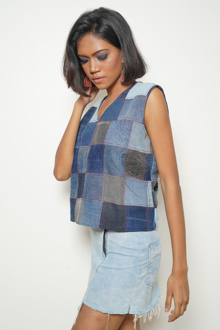 Checker Denim Sleeveless Top: A chic and versatile sleeveless top with a checker pattern.