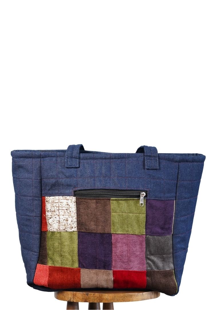 Denim Beach Bag by Bunko Junko: A stylish and durable bag made from upcycled denim, perfect for beach outings.