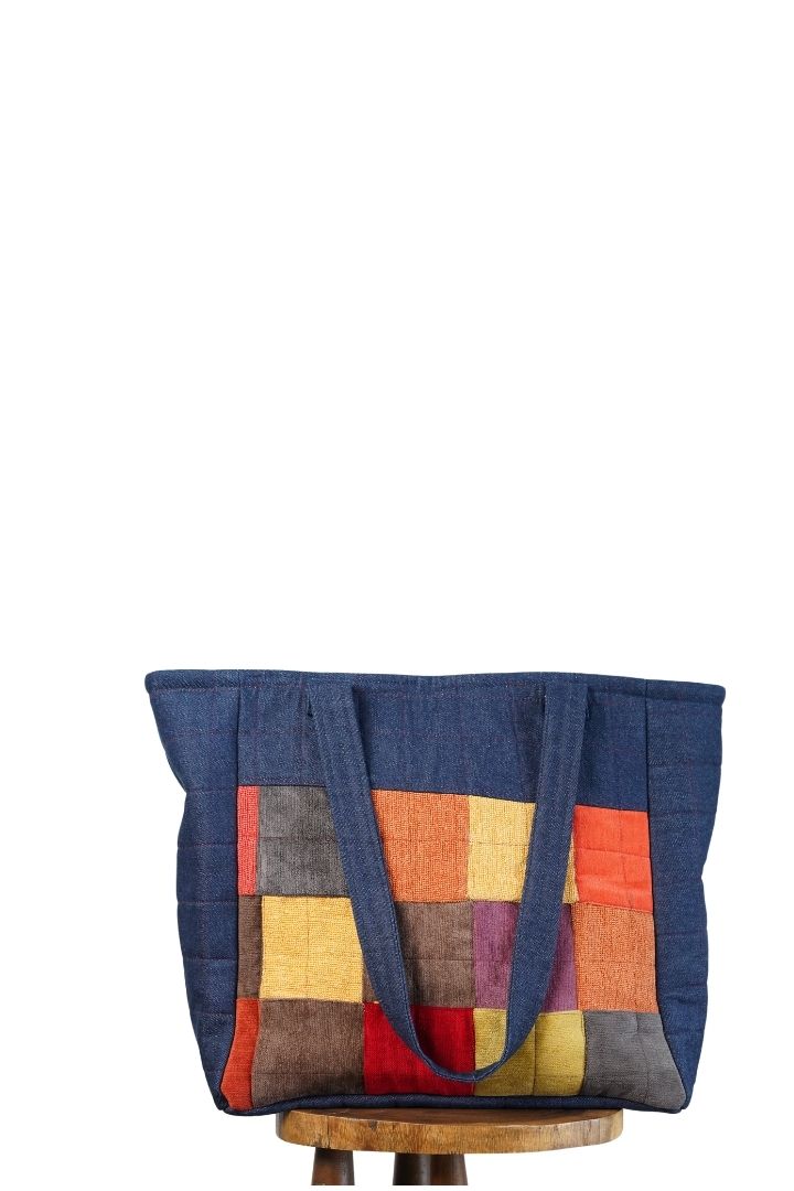 Denim Beach Bag by Bunko Junko: A stylish and durable bag made from upcycled denim, perfect for beach outings.