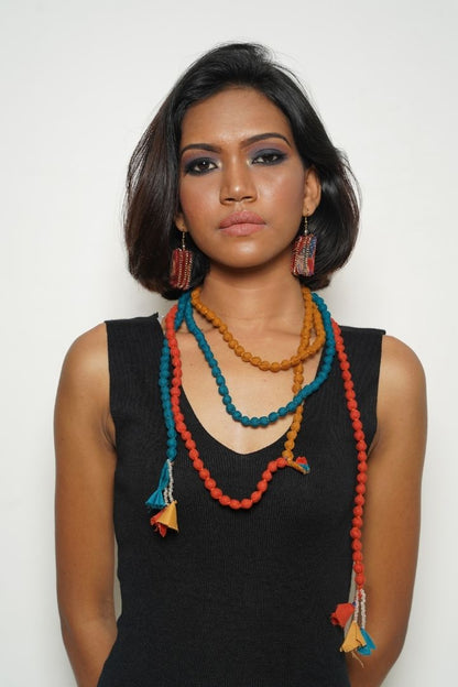 Divine Drapes Necklace by Bunko Junko: A stunning necklace with elegant, cascading details, perfect for a refined look.