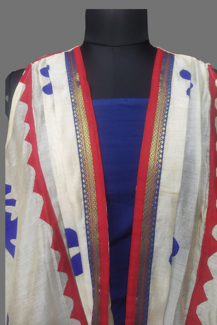 Elegance Enfold Shrug by Bunko Junko: A chic shrug crafted from upcycled fabric, perfect for layering with style.