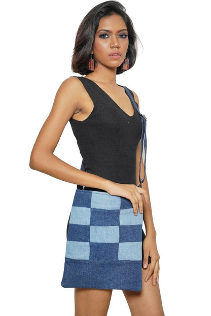 Patchwork Denim Sling by Bunko Junko: A trendy, upcycled denim sling bag featuring a unique patchwork pattern.