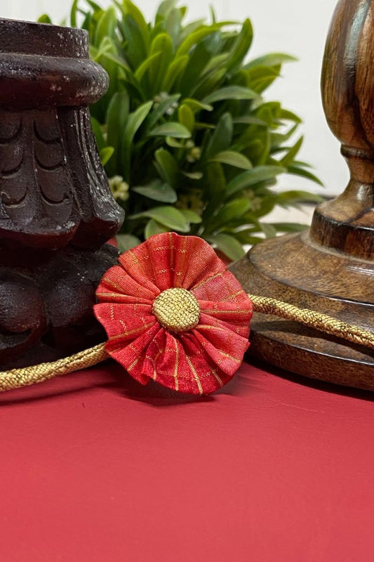 Handcrafted Rakhi symbolizes love and protection for sacred celebrations.