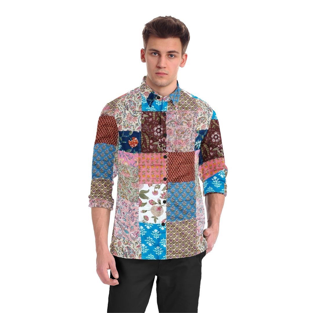 A colorful Kaleidoscope Patchwork Shirt featuring a vibrant mix of upcycled fabrics in various patterns and hues. The shirt showcases a unique, eye-catching patchwork design.