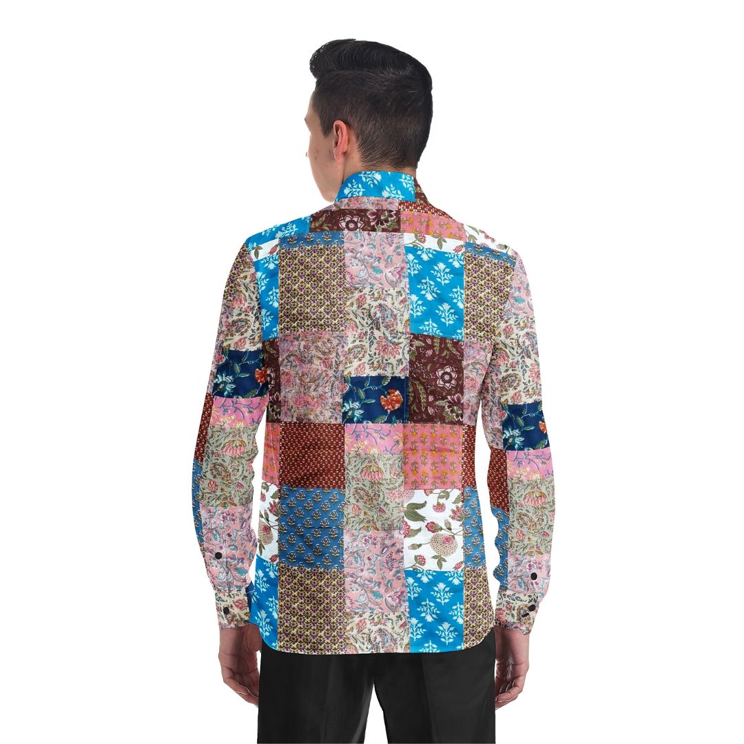 A colorful Kaleidoscope Patchwork Shirt featuring a vibrant mix of upcycled fabrics in various patterns and hues. The shirt showcases a unique, eye-catching patchwork design.