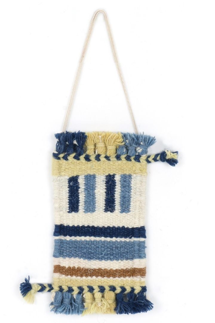 Miniature Wool Rug Wall Decor by Bunko Junko: A charming, handcrafted wool rug perfect for adding a cozy touch to your walls.