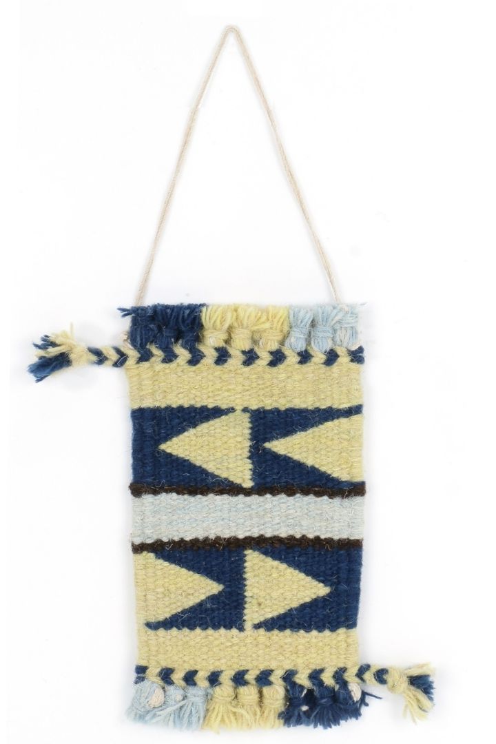 Miniature Wool Rug Wall Decor by Bunko Junko: A charming, handcrafted wool rug perfect for adding a cozy touch to your walls.