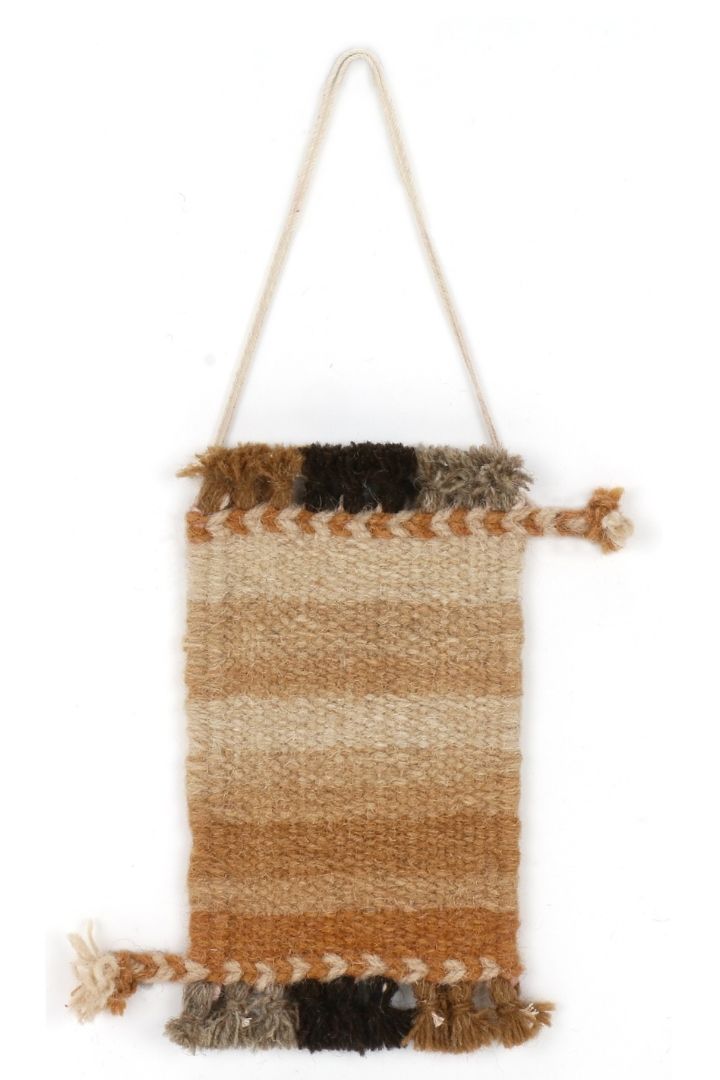 Miniature Wool Rug Wall Decor by Bunko Junko: A charming, handcrafted wool rug perfect for adding a cozy touch to your walls.