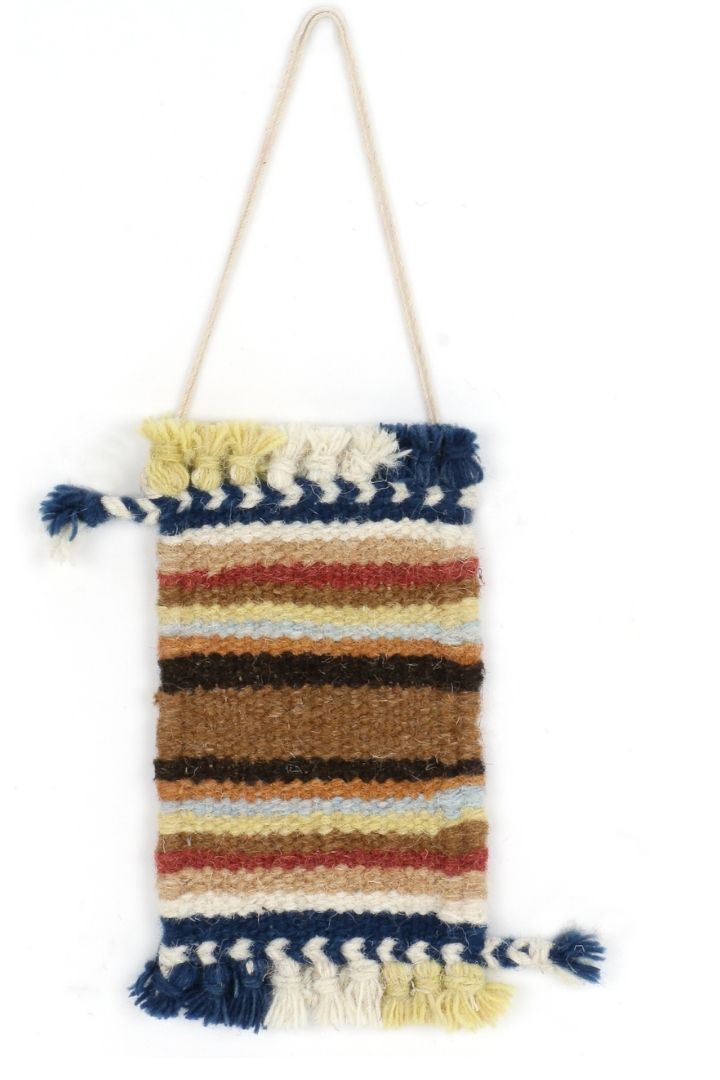 Miniature Wool Rug Wall Decor by Bunko Junko: A charming, handcrafted wool rug perfect for adding a cozy touch to your walls.