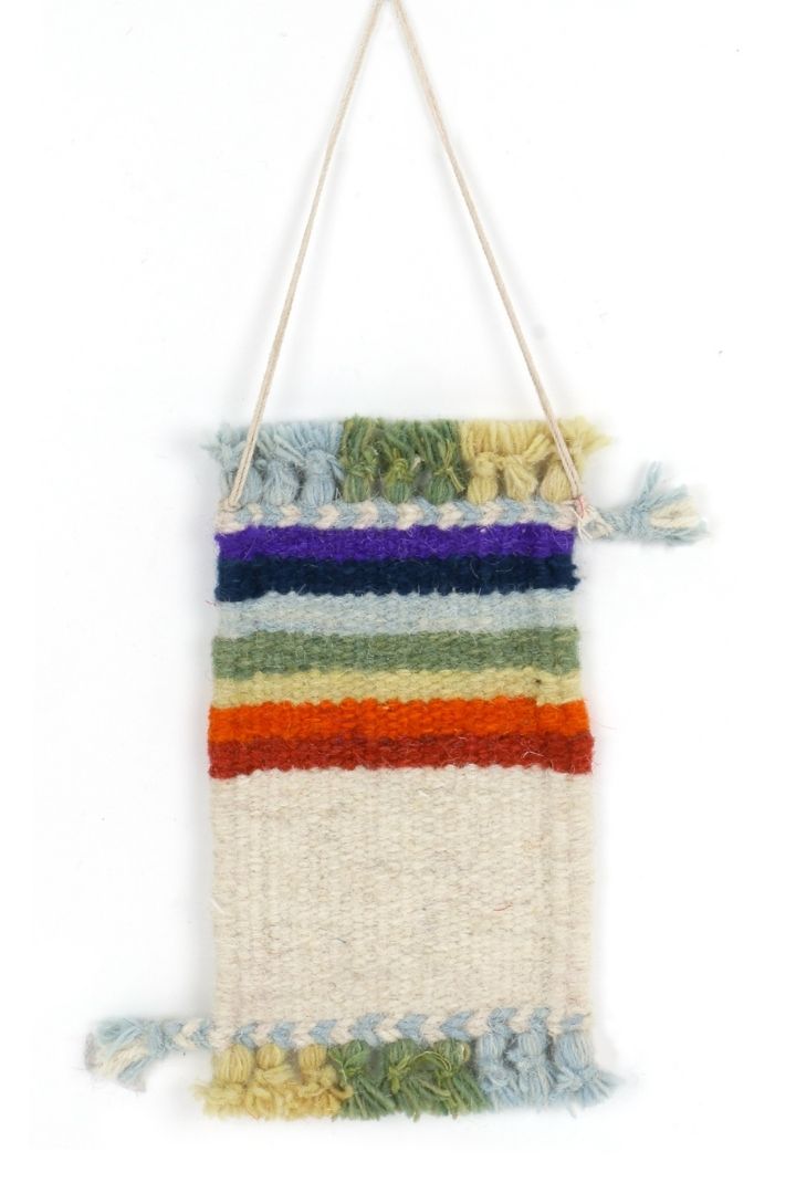 Miniature Wool Rug Wall Decor by Bunko Junko: A charming, handcrafted wool rug perfect for adding a cozy touch to your walls.