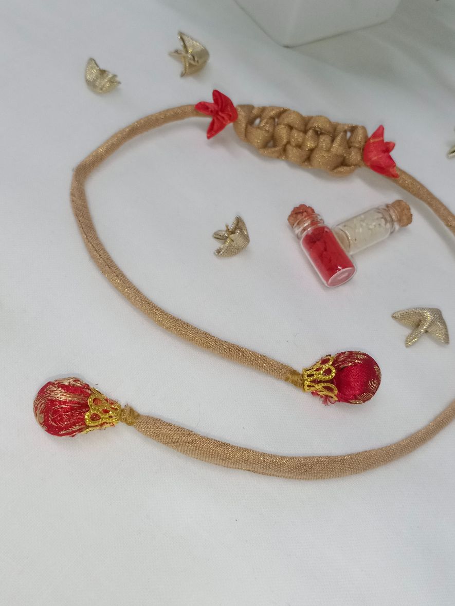 Handcrafted textile Rakhi made from eco-friendly offcuts for Pavitra Tyohar celebration.