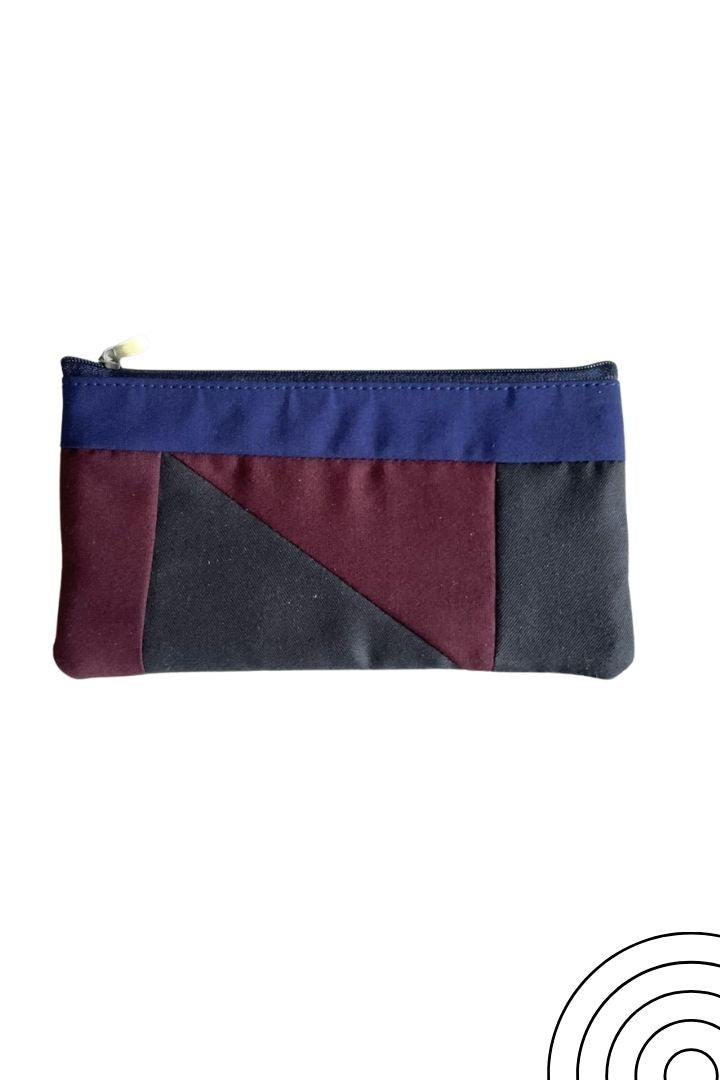Modern Minimalist Pouch by Bunko Junko: A sleek, upcycled pouch with a simple, contemporary design.